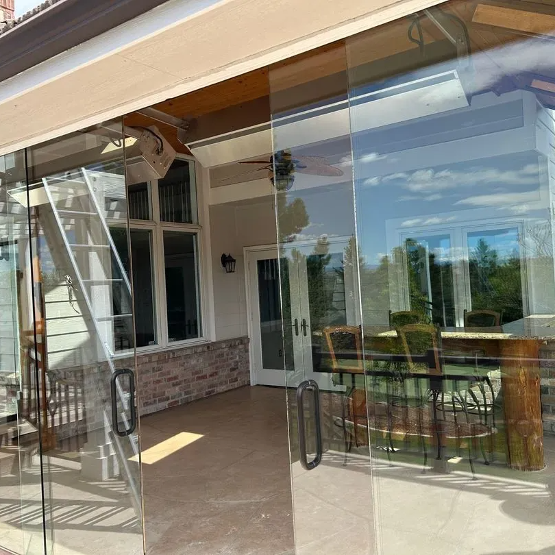 Spotless windows of an Boulder CO home shining in the sun